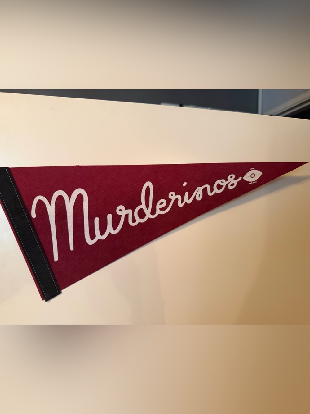 Burgundy Pennant with White Script "Murderinos"